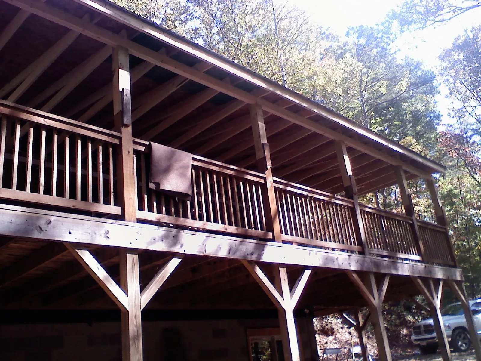 Timber framing under a new elevated porch and deck — Roof Leak Repair in Random Lake by Roofing Brothers